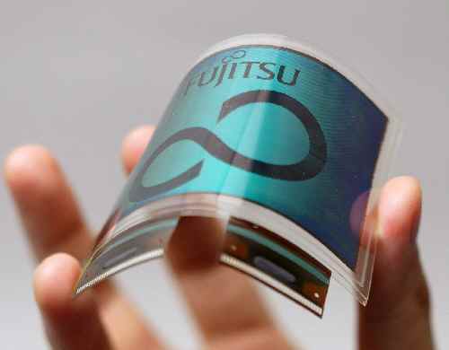 World's first film substrate-based bendable color electronic paper with image memory function (shown being bent)