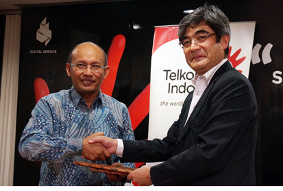 Photo: (Left) Arief Musta'in, Executive General Manager of Digital Service Division, PT. Telekomunikasi Indonesia, Tbk; (Right) Fumihiko Tezuka, Corporate Executive Officer, SVP, Head of Social Infrastructure Business, Fujitsu Limited