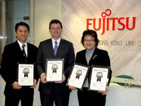 John Donnelly, Managing Director of BLI, presenting the "Pick of the Year" Awards to Fujitsu
