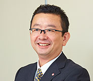 トオカツフーズ株式会社 情報システム部長 大村司氏の写真