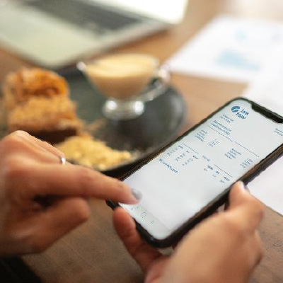 Using a smartphone in a coffeeshop