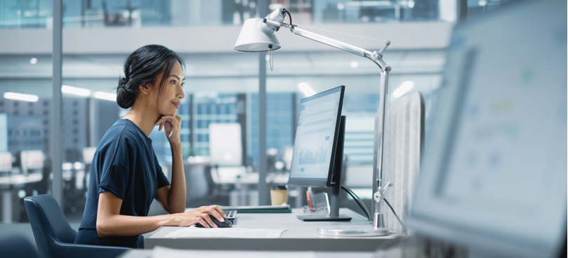 woman sitting in front of a computer