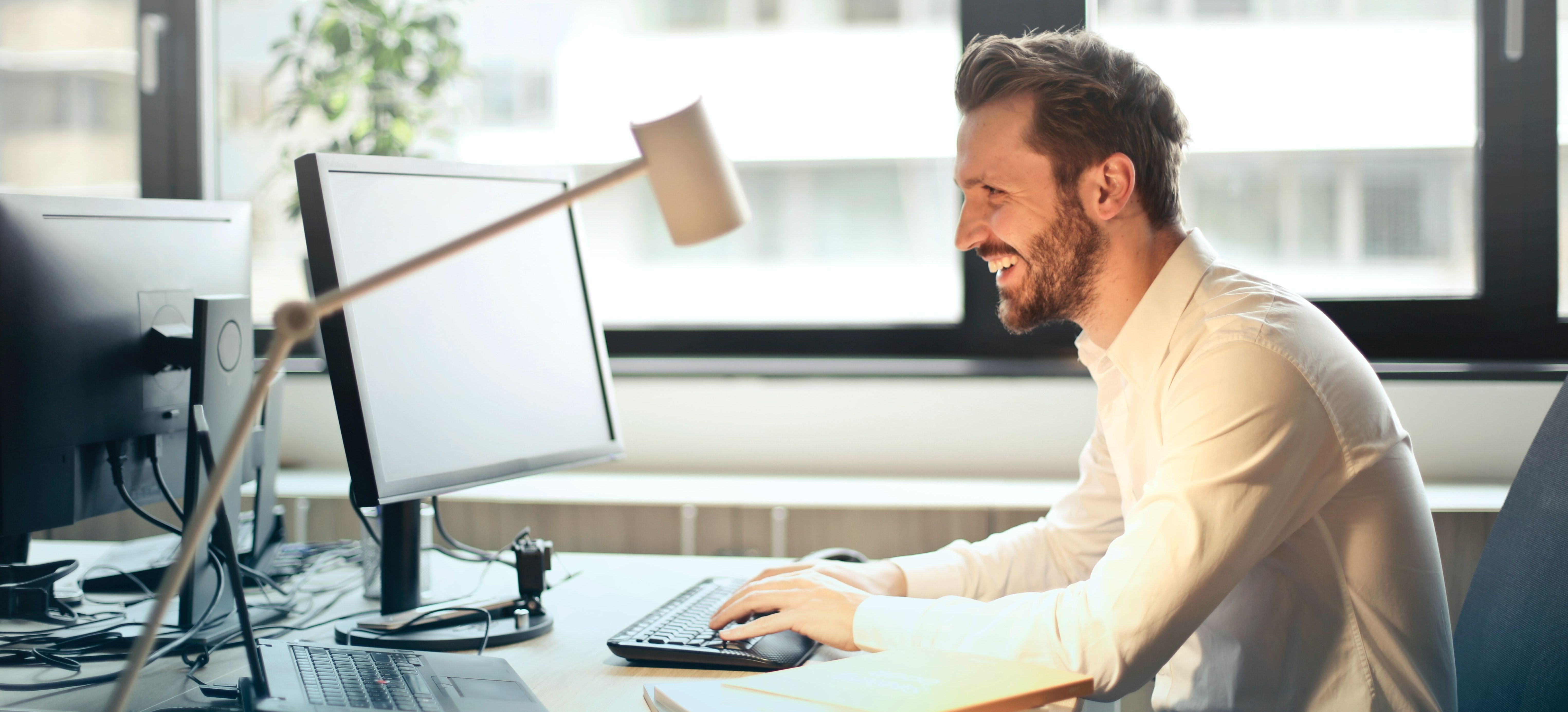 Man sitting in front of a computer