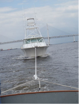 Picture: Pleasure craft being towed by a rescue boat