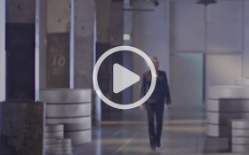 Woman walking in an industrial setting