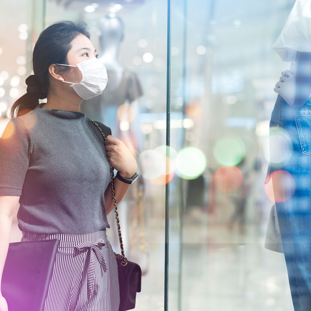 Customer shopping in store whilst wearing a face mask