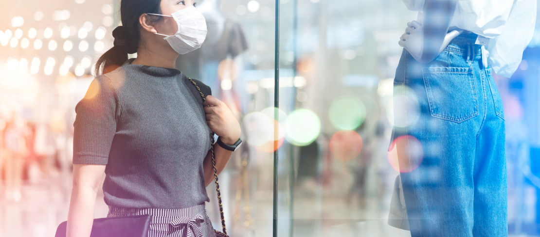 Customer shopping in store whilst wearing a face mask