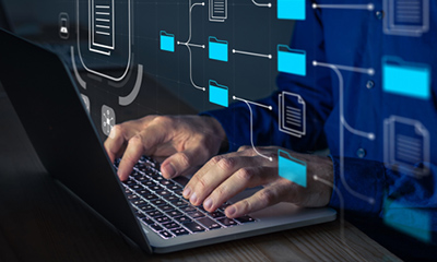 Hands typing as an example of data exchange.