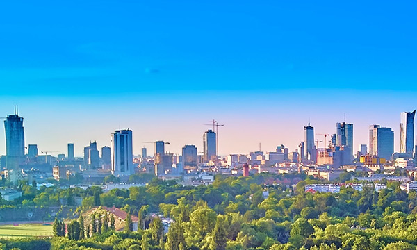 A water front city on the horizon depicting a sustainable society.