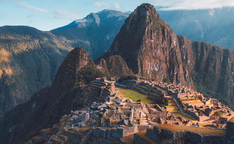 a stone ruins on a mountain