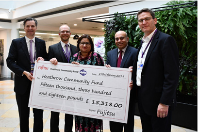 Presentation of the Heathrow Community fund by CEO John Holland-Kaye (far left) and Stuart Birrell CIO (far right)