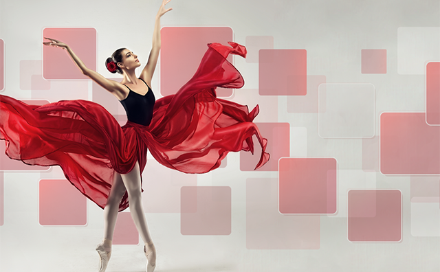 Photo of an elegant ballet dancer against a backdrop of red blocks