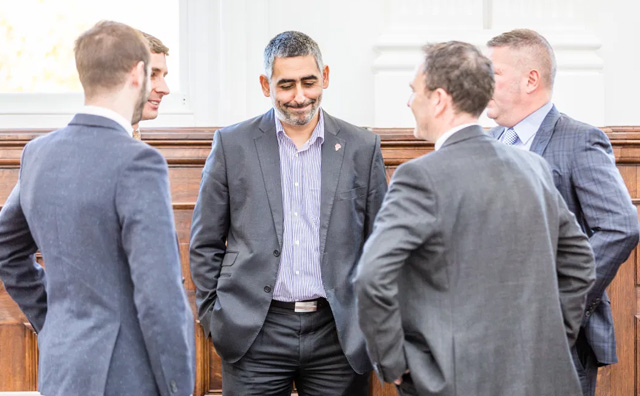 Five men in suits