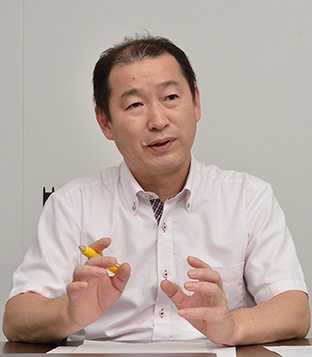 小野 謙二 氏