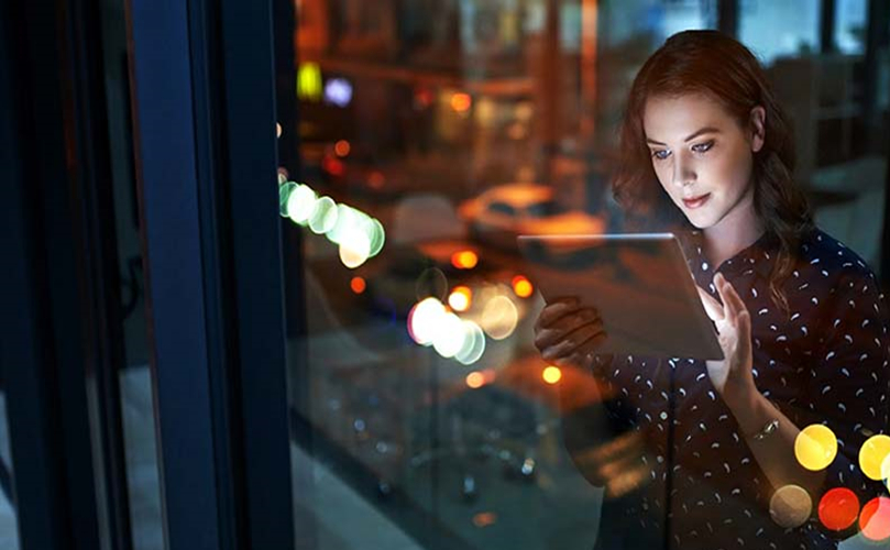 woman inside house with an Ipad