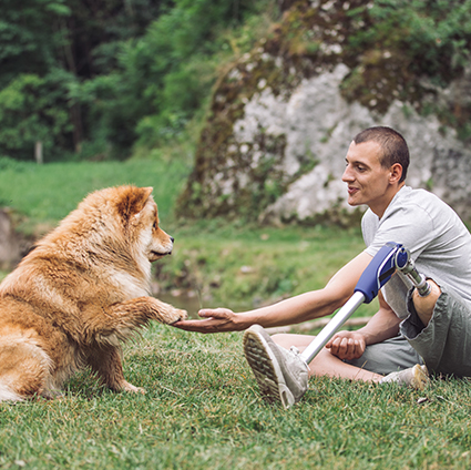 Disability man and pet relaxing