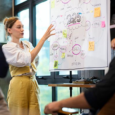 young-people-in-office-planning-session-for-2023
