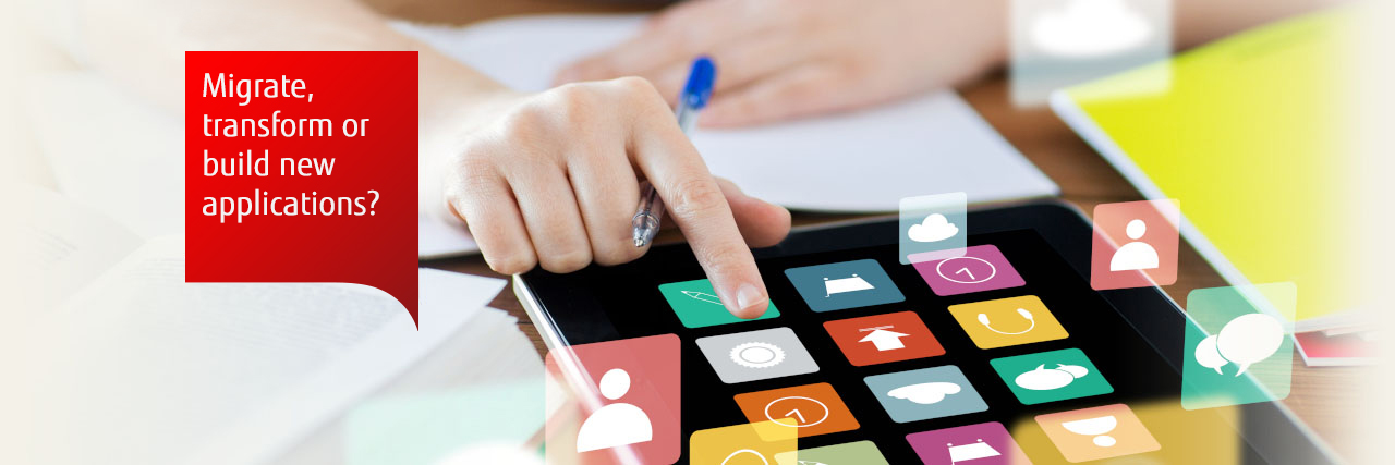 Photo of a woman selecting icons on a tablet screen