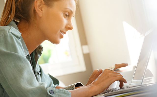 Woman using laptop